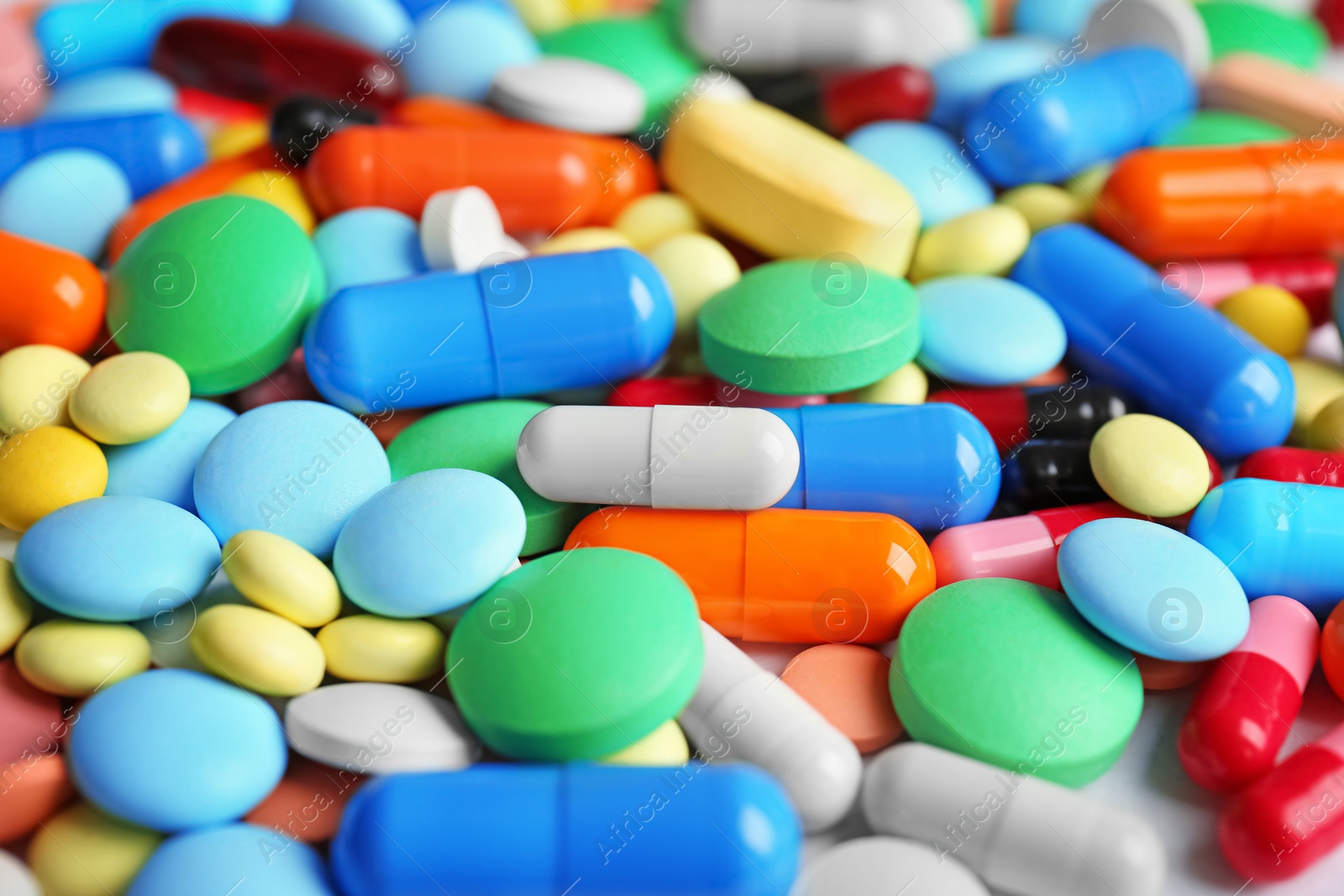 Photo of Many colorful pills as background