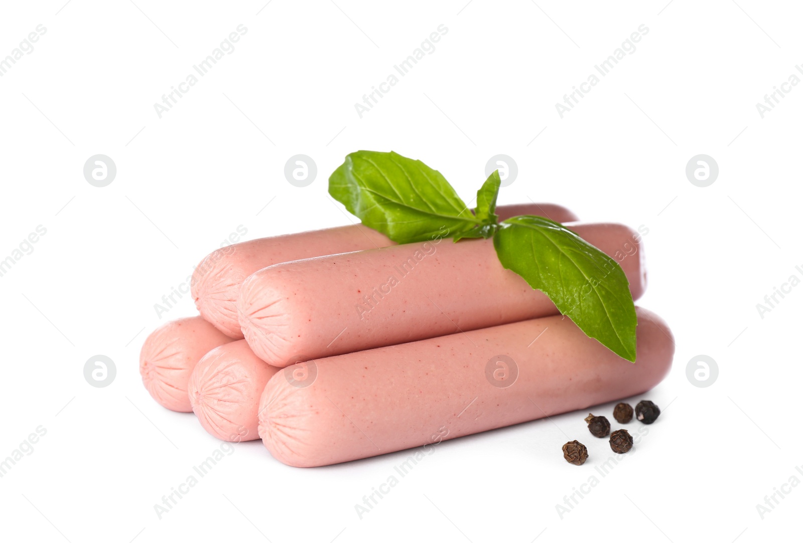 Photo of Raw vegetarian sausages with basil on white background