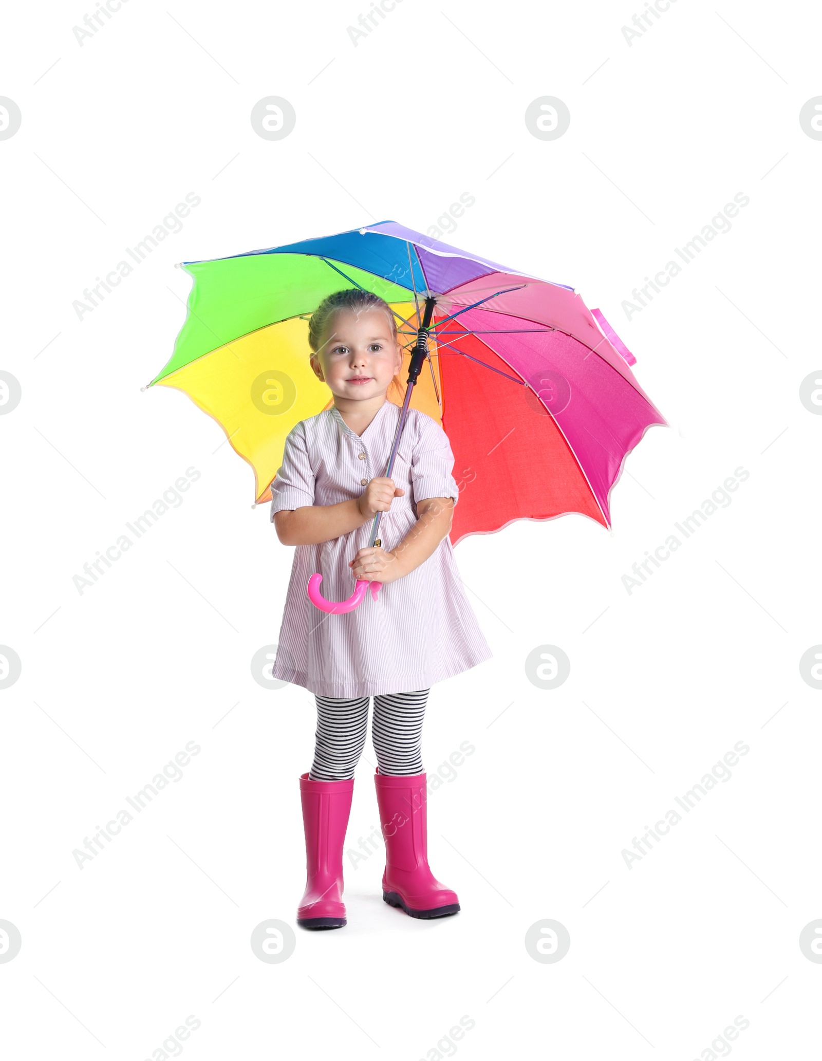 Photo of Little girl with rainbow umbrella on white background