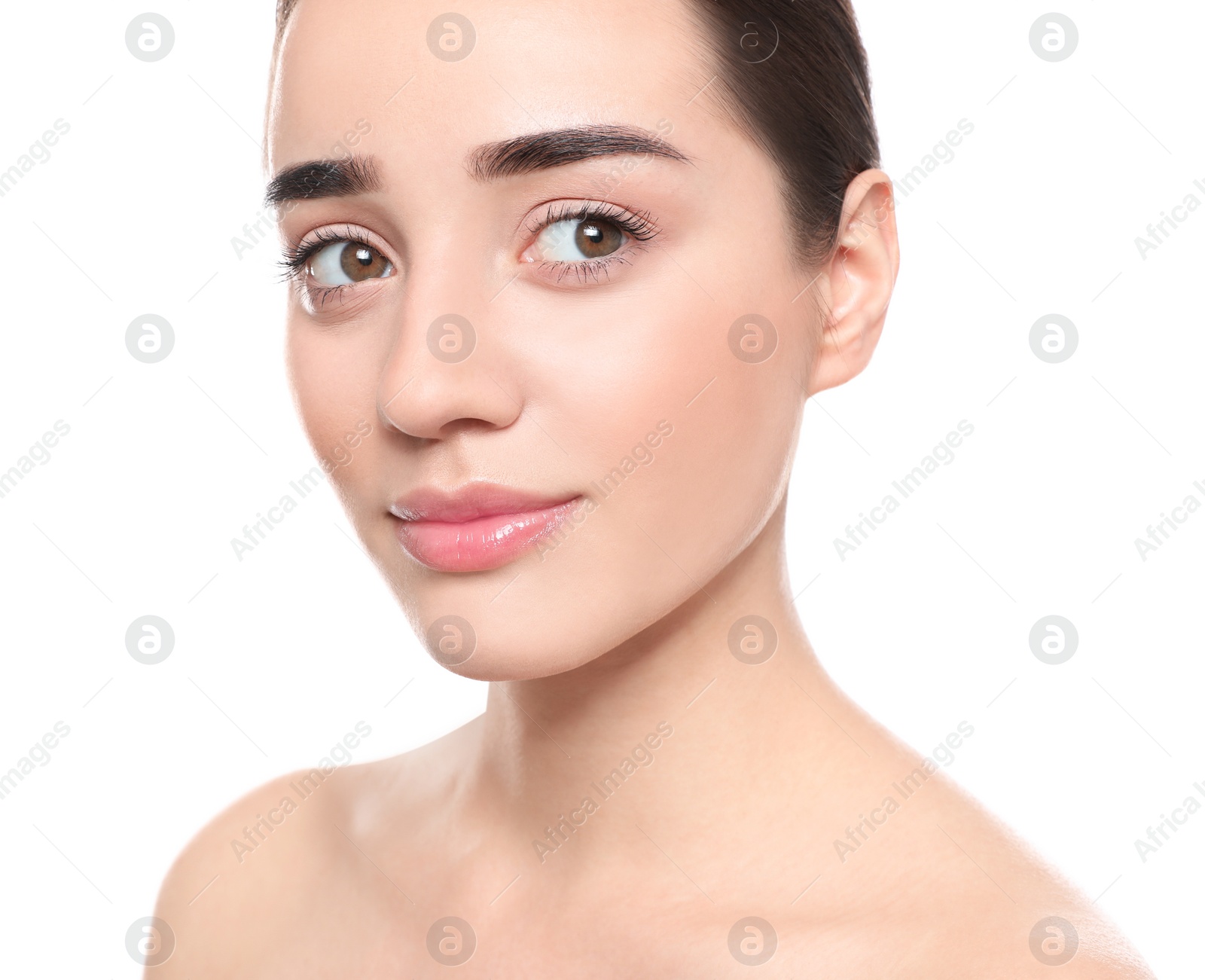 Photo of Portrait of young woman with beautiful face against white background