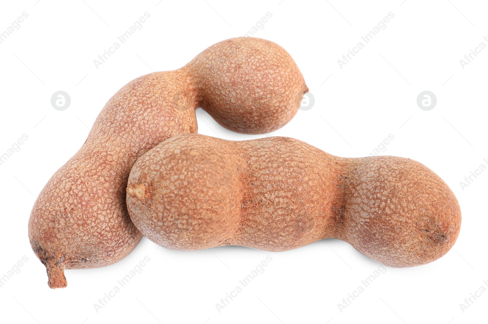 Photo of Delicious ripe tamarinds on white background, top view. Exotic fruit