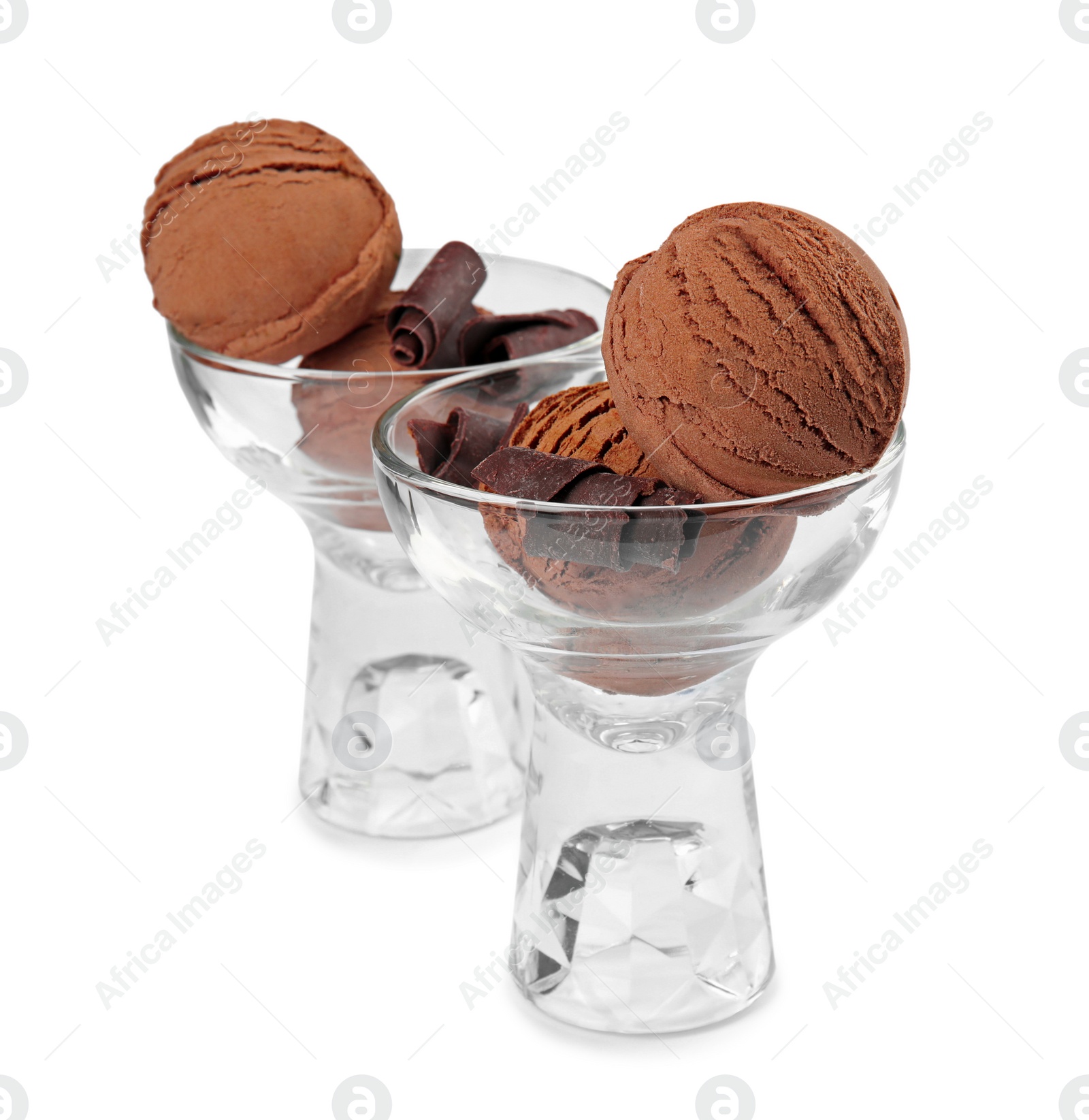 Photo of Glass bowls of tasty ice cream with chocolate curls isolated on white