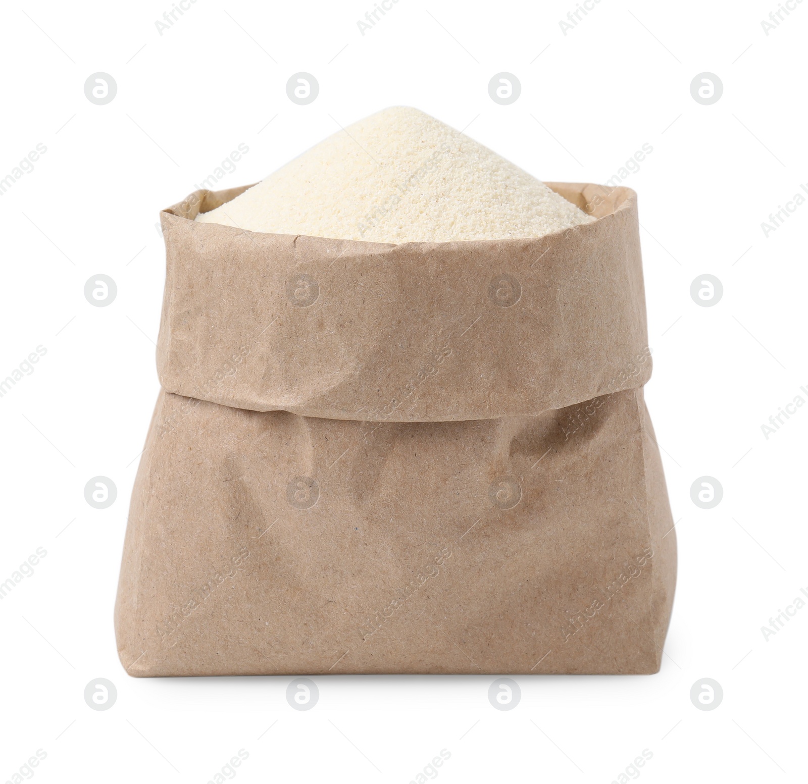 Photo of Paper bag with uncooked organic semolina isolated on white