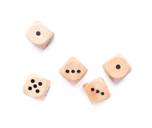 Many wooden game dices isolated on white, top view