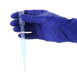Scientist holding transfer pipette with liquid on white background, closeup