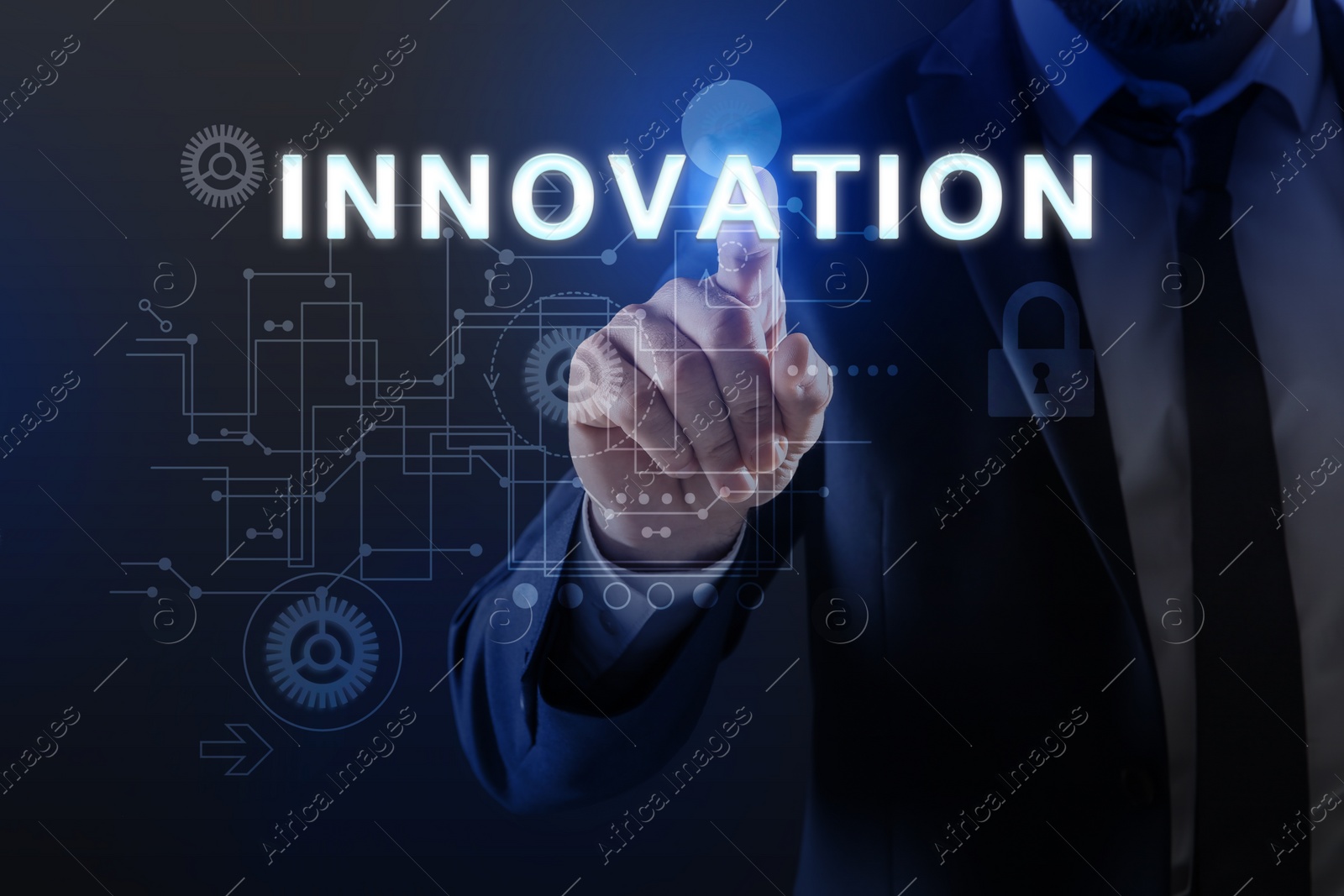 Image of Man touching word Innovation on digital screen against dark background, closeup
