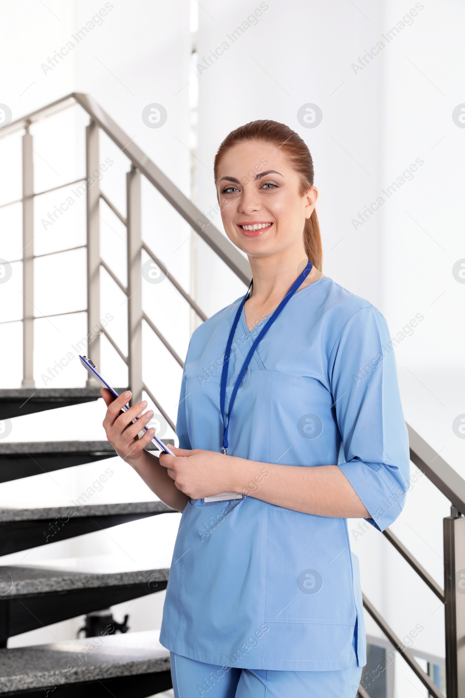 Photo of Portrait of young nurse in hospital. Medical assistant