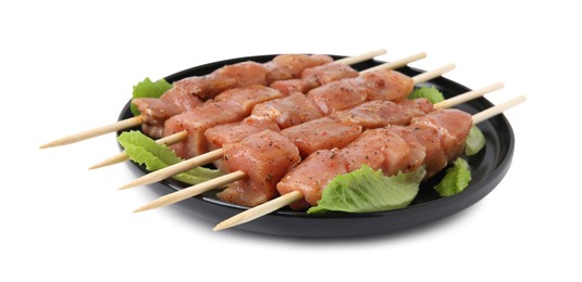 Photo of Wooden skewers with cut raw marinated meat isolated on white