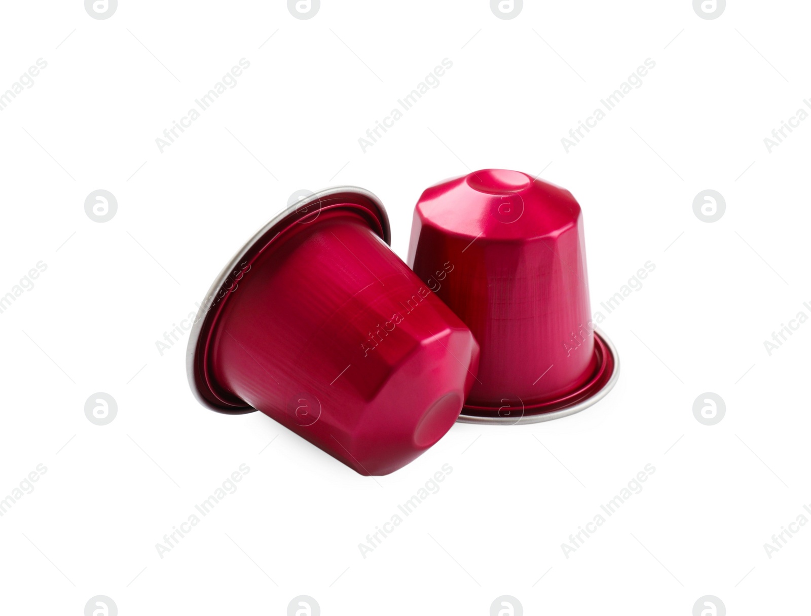 Photo of Two plastic coffee capsules isolated on white