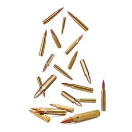 Many bullets falling on white background. Firearm ammunition