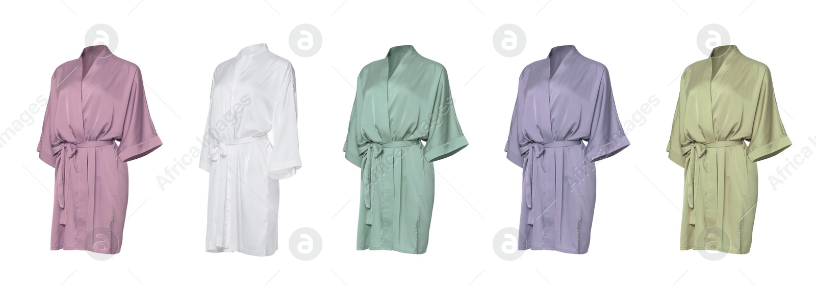 Image of Set of different color silk bathrobes on white background