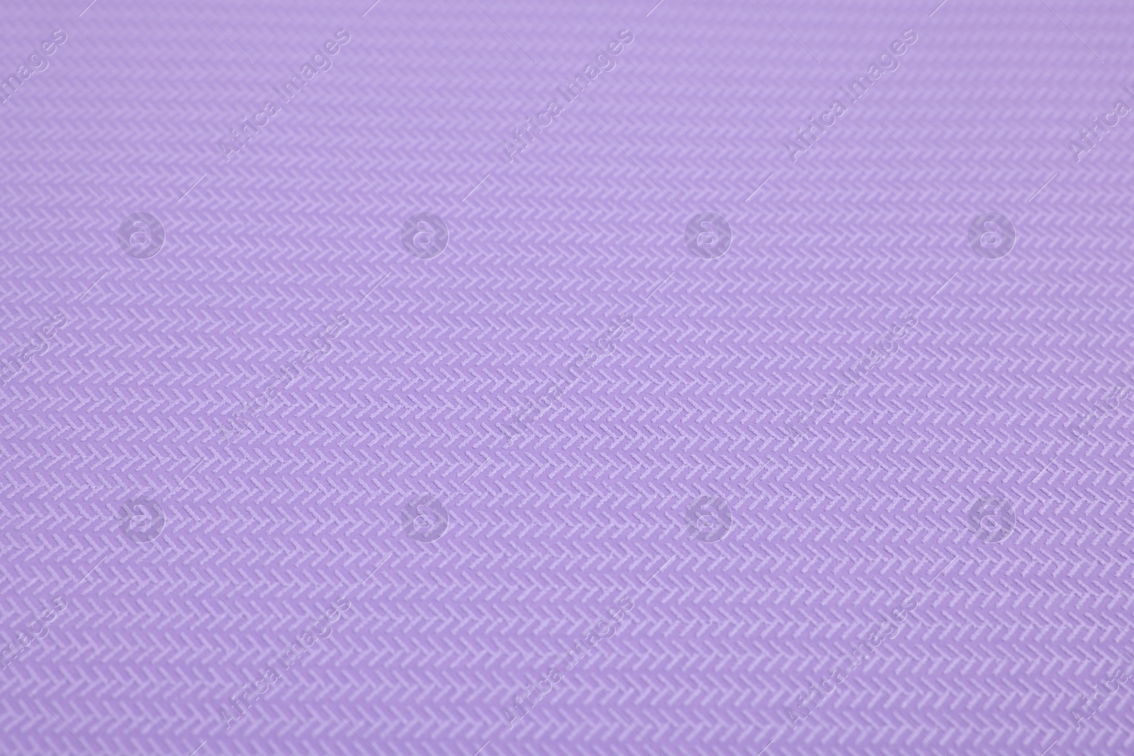 Photo of Stylish violet wallpaper as background, closeup view