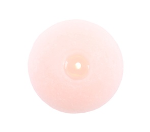 Burning pink candle isolated on white, top view