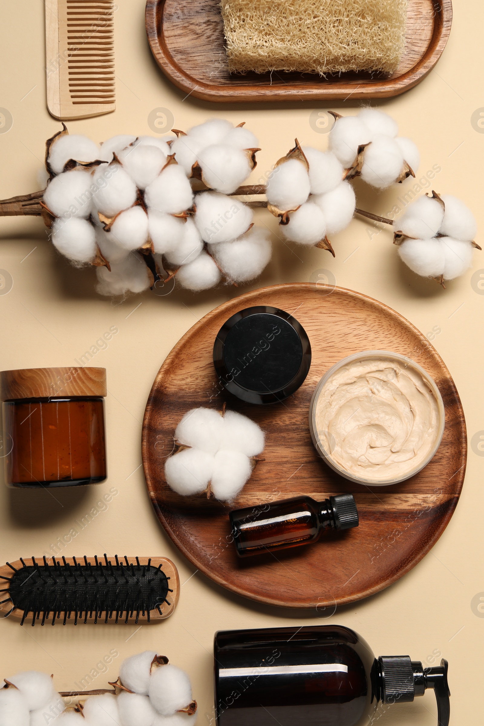 Photo of Bath accessories. Flat lay composition with personal care products on beige background