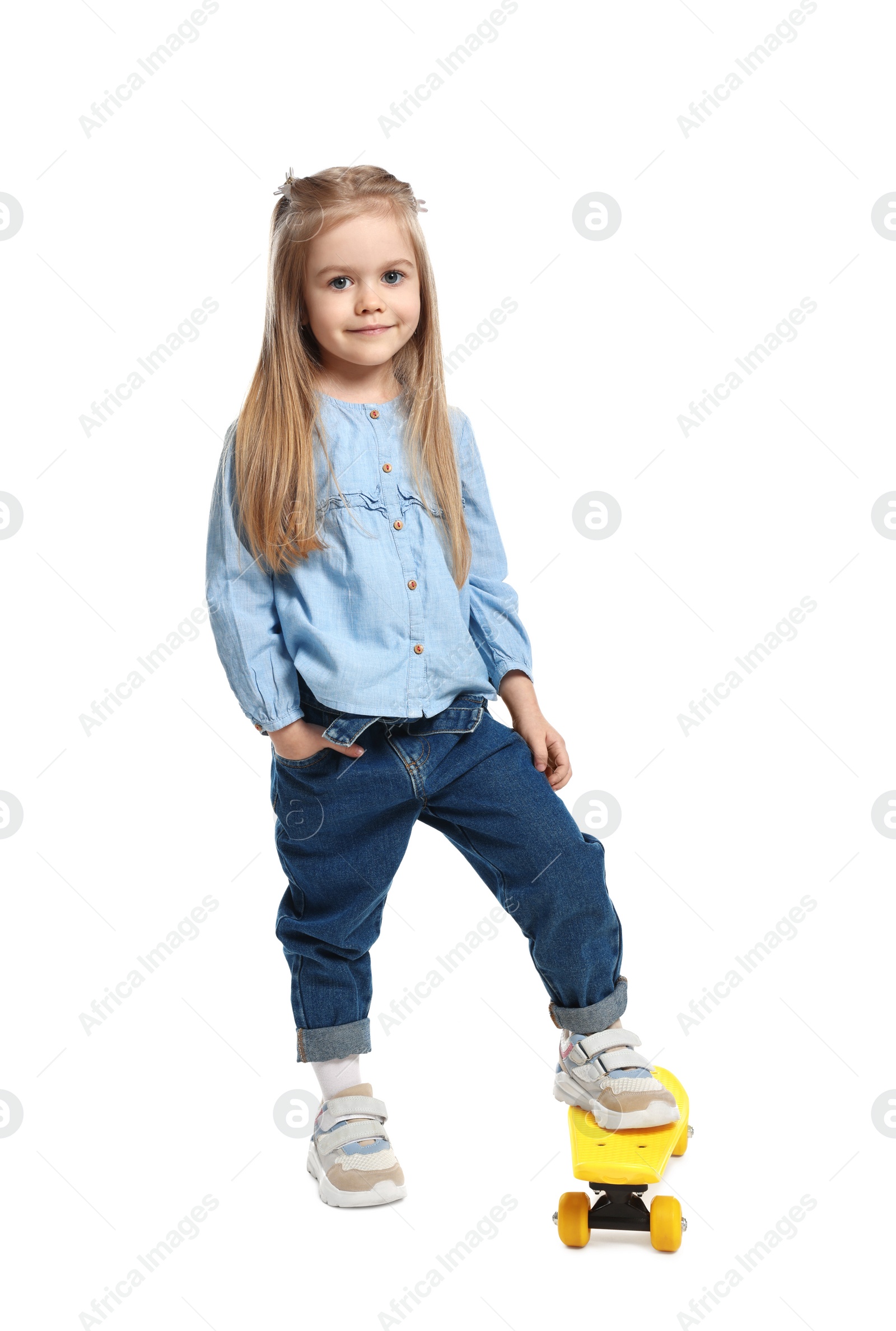 Photo of Fashion concept. Stylish girl with skateboard on white background