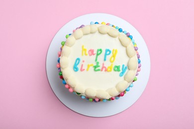 Photo of Cute bento cake with tasty cream on pink background, top view