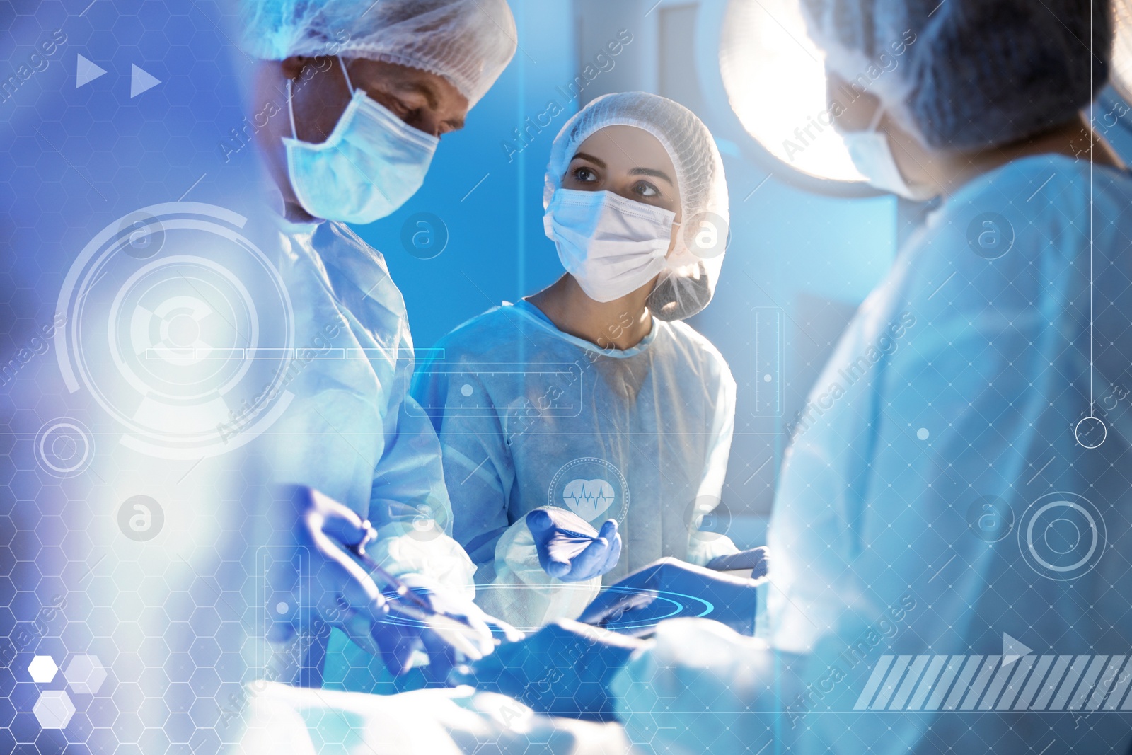 Image of Team of professional doctors performing operation in surgery room and illustration of different virtual icons