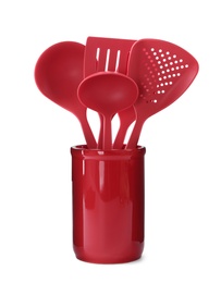 Holder with different kitchen utensils on white background