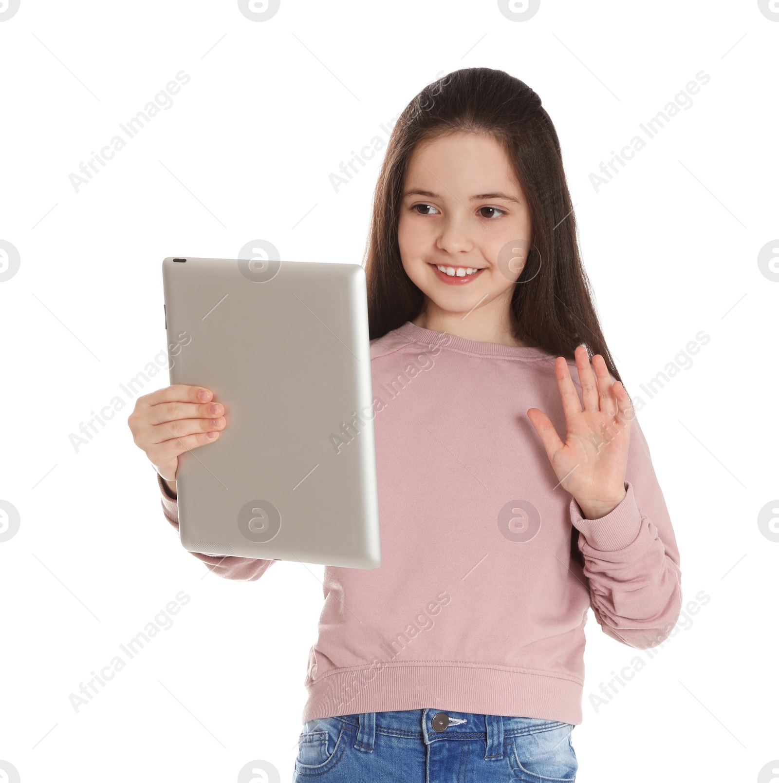 Photo of Little girl using video chat on tablet against white background