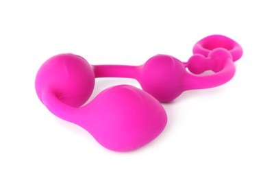 Photo of Pink anal balls on white background. Sex toy