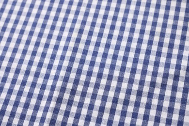 Photo of Blue checkered tablecloth as background, closeup view