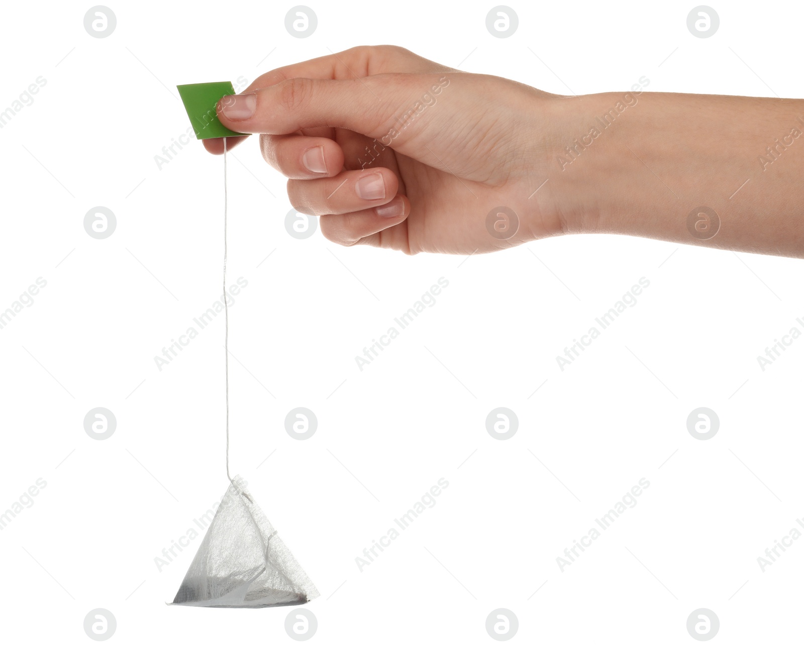 Photo of Woman holding tea bag on white background