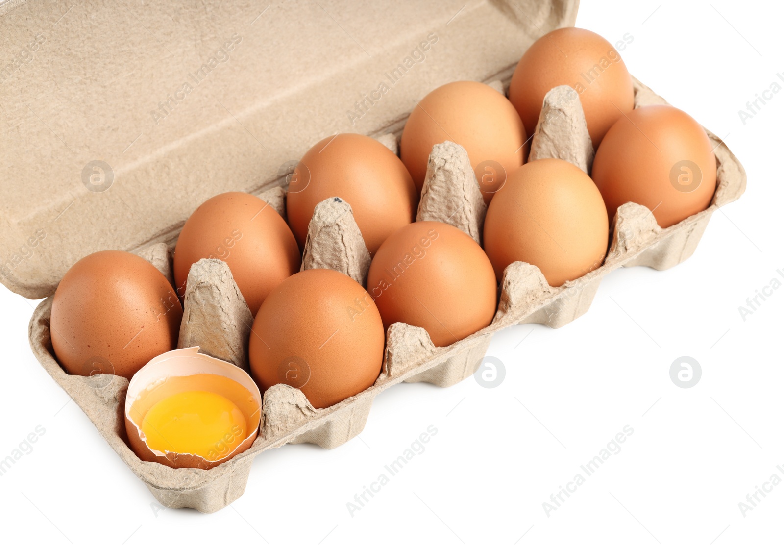 Photo of Chicken eggs in carton isolated on white