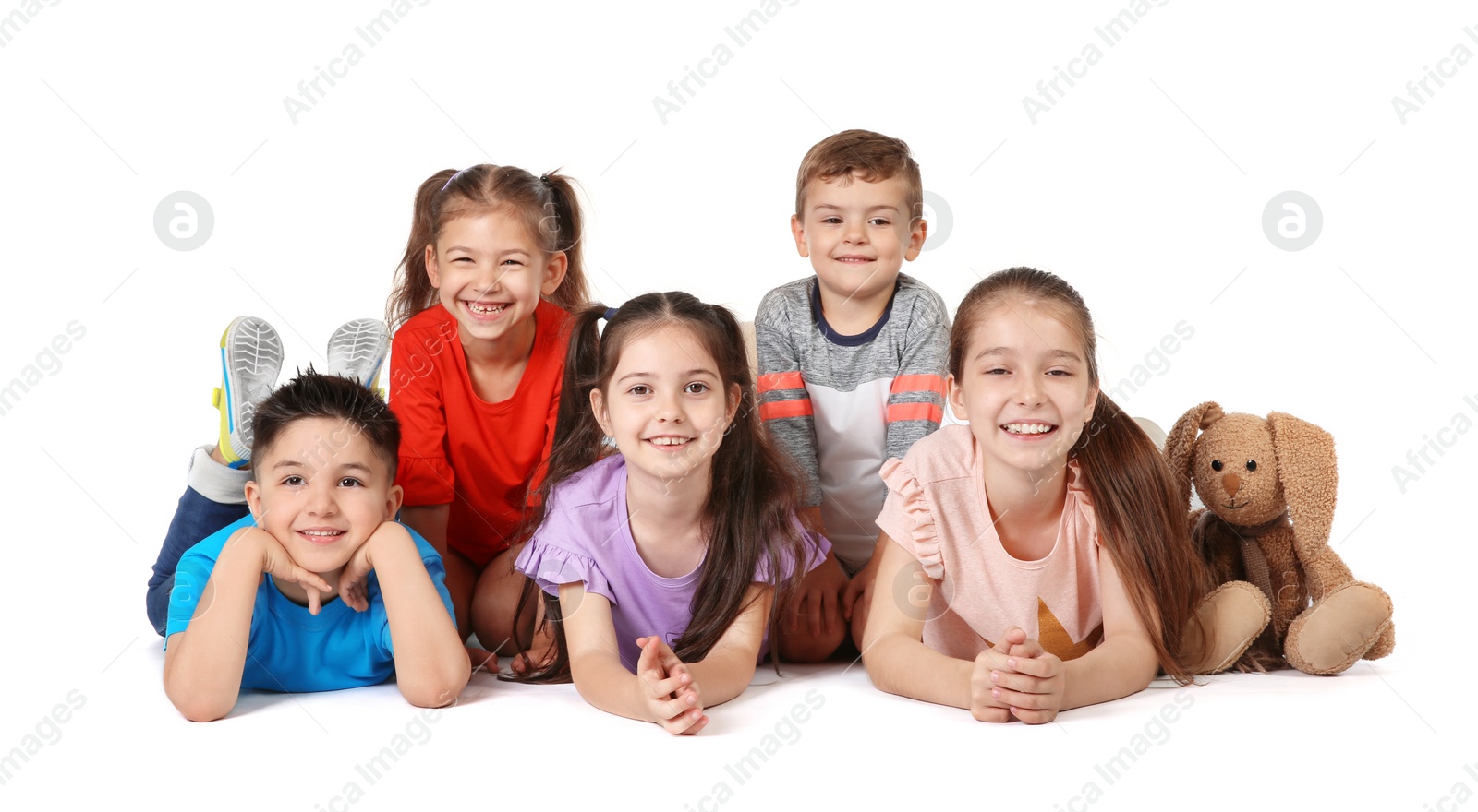 Photo of Playful little children on white background. Indoor entertainment