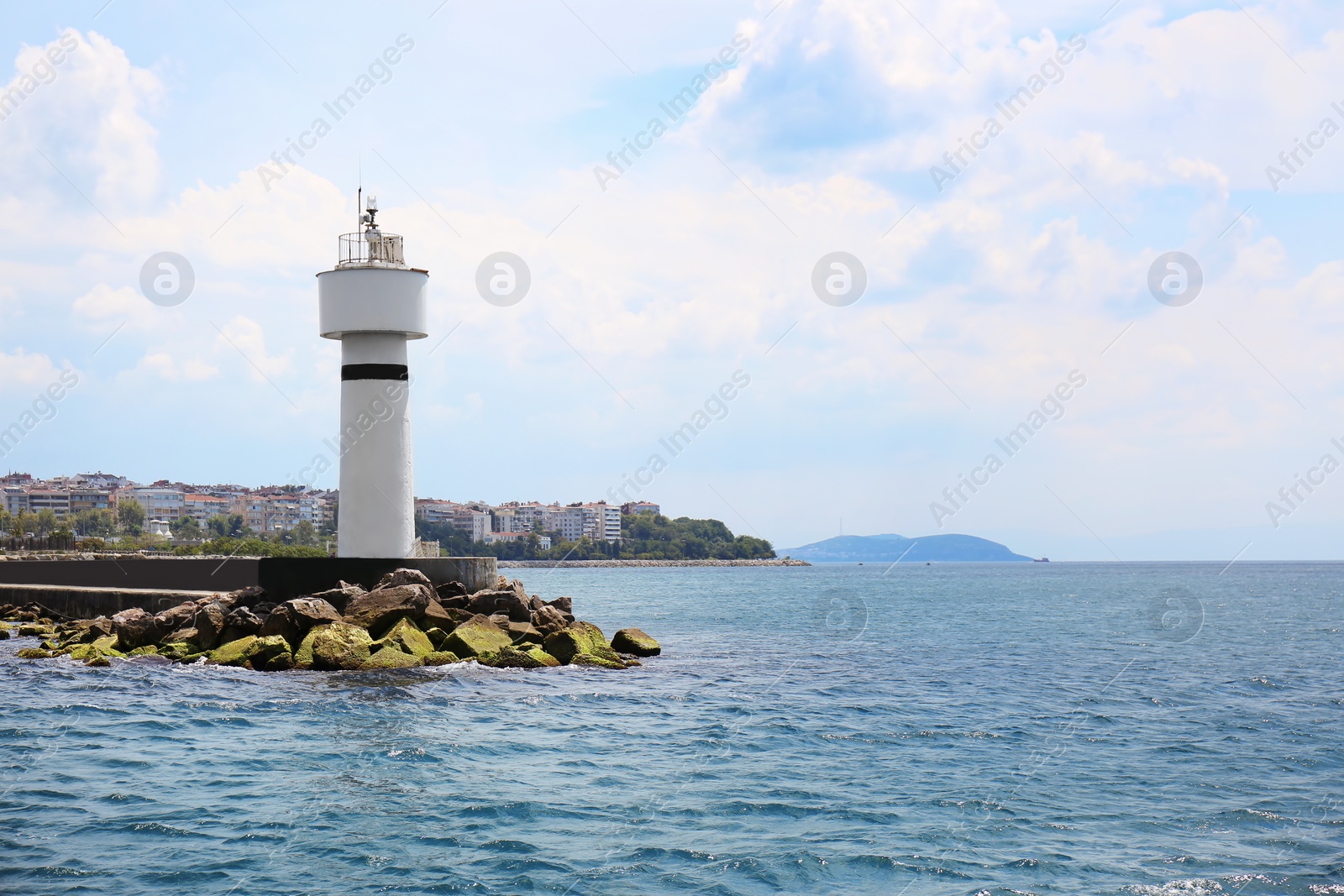 Photo of Beautiful view of sea coast with lighthouse