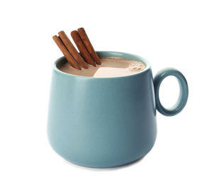 Delicious cocoa drink with cinnamon sticks on white background