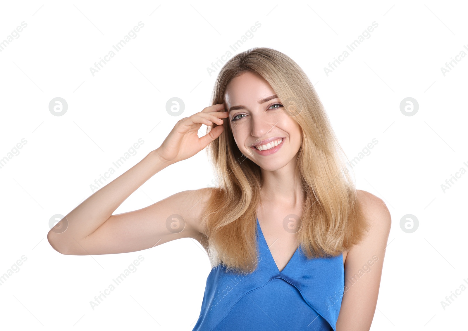 Photo of Portrait of beautiful young woman with blonde hair on white background