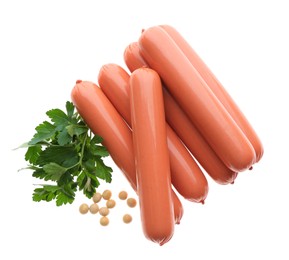 Photo of Fresh raw vegetarian sausages, parsley and soybeans on white background, top view