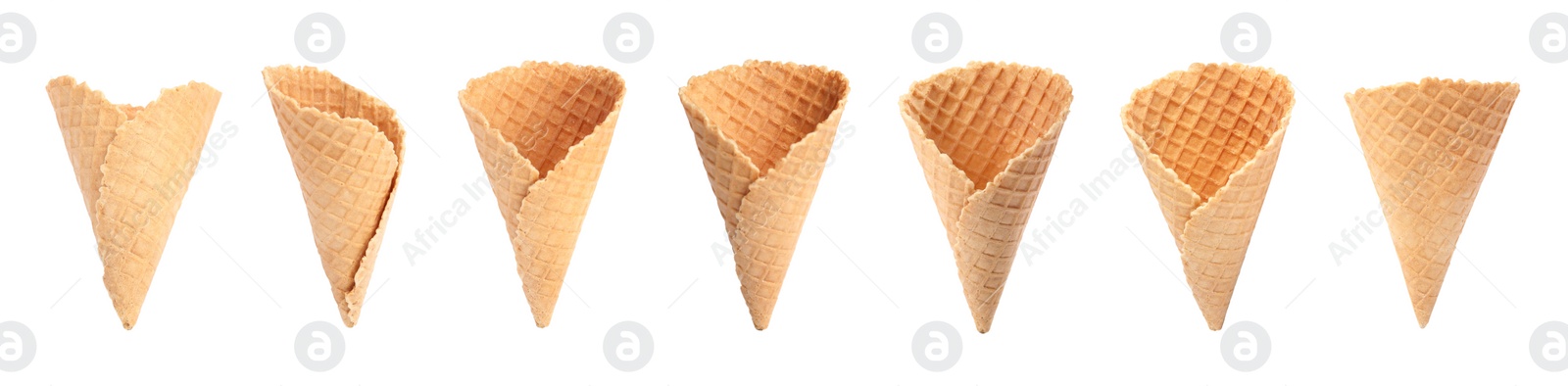 Image of Set of empty wafer ice cream cones on white background. Banner design