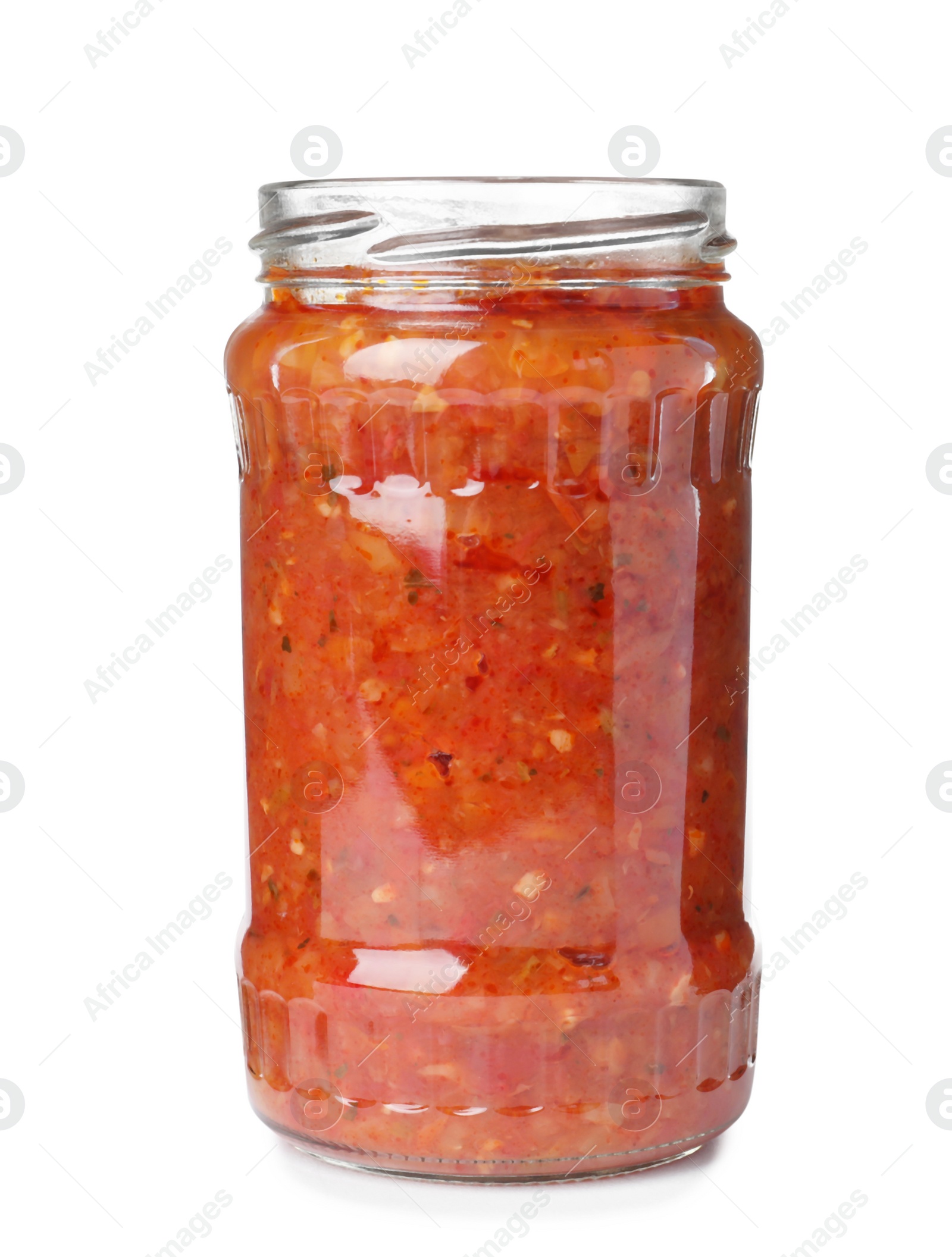 Photo of Glass jar with pickled red sauce isolated on white