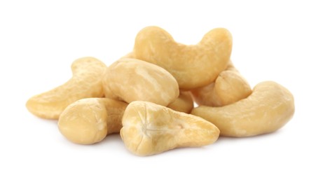 Pile of tasty organic cashew nuts isolated on white