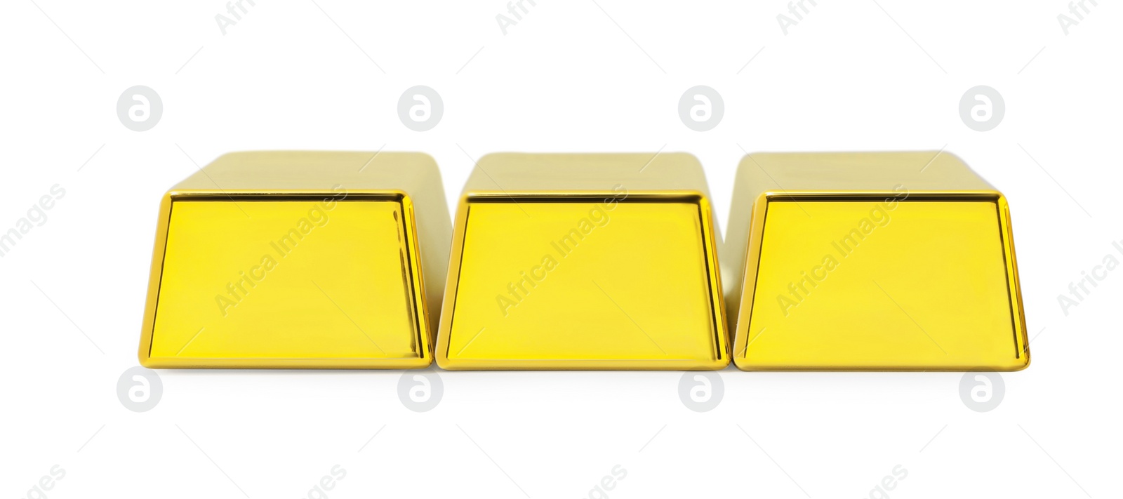 Photo of Three shiny gold bars isolated on white