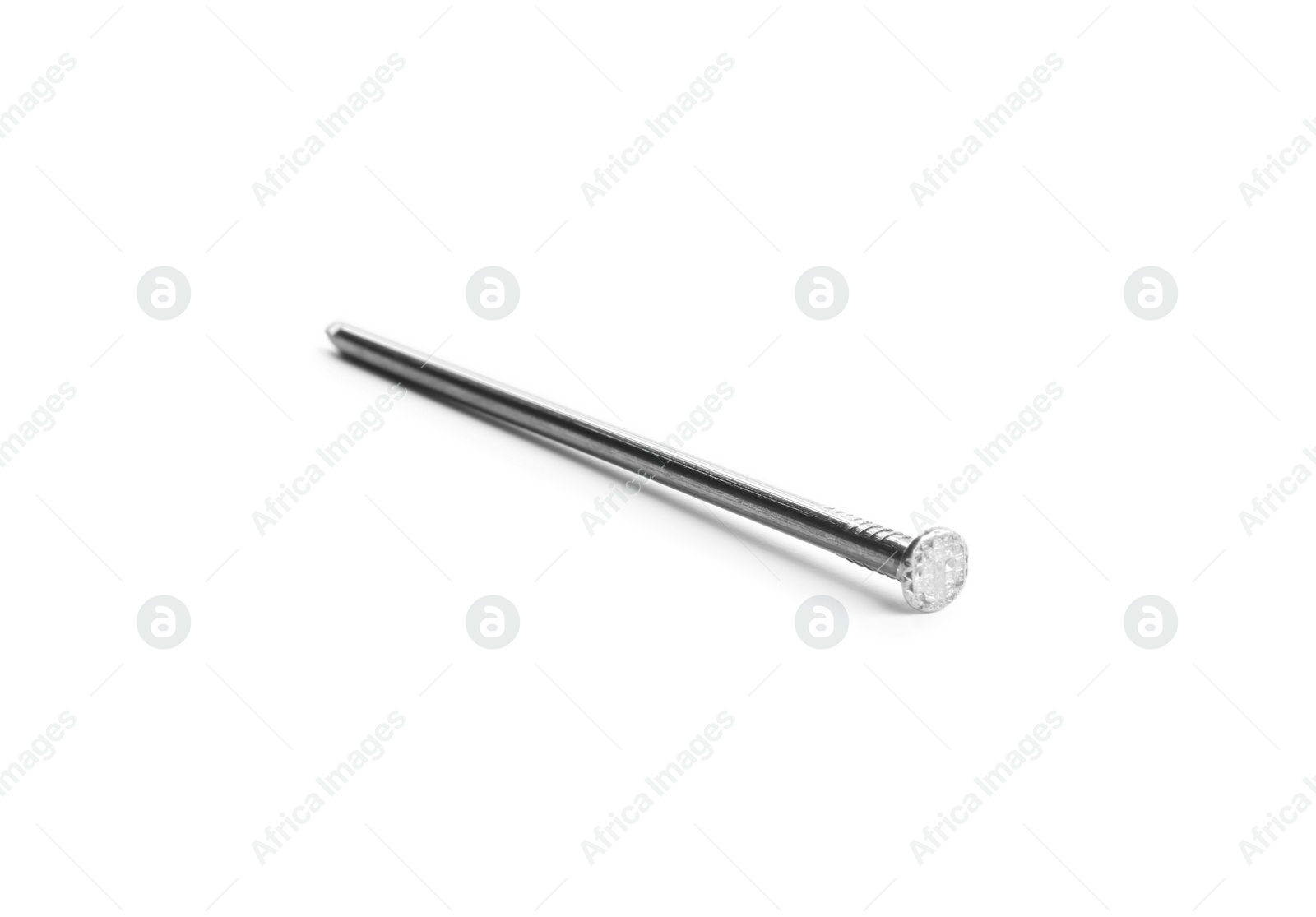 Photo of One shiny metal nail isolated on white