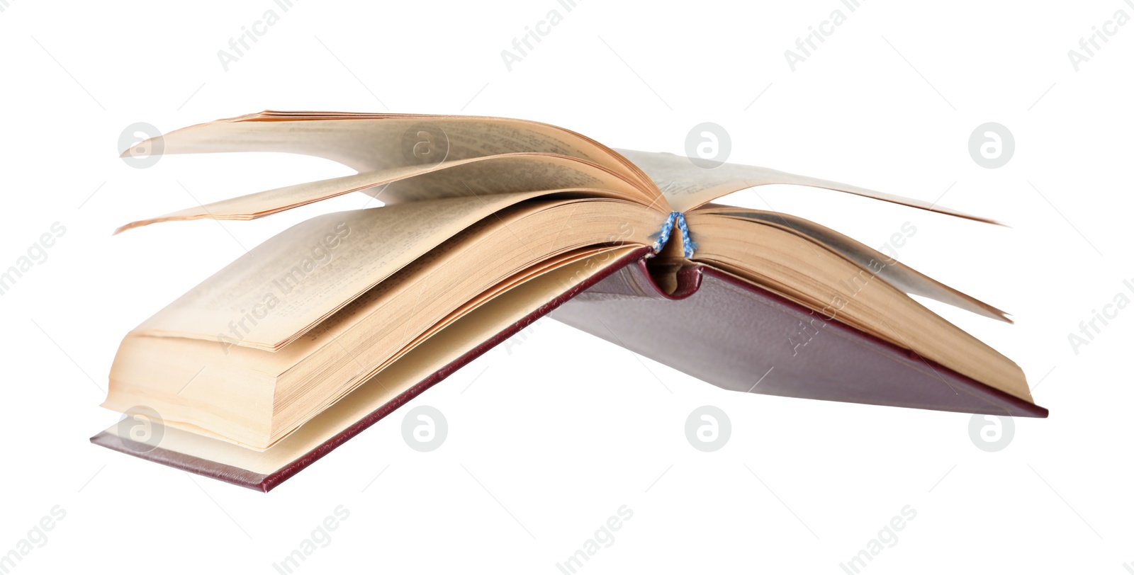 Photo of Open old hardcover book on white background