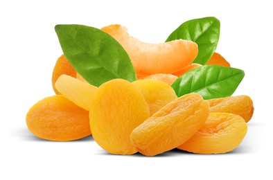 Image of Tasty dried apricots and green leaves on white background