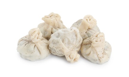 Many tasty khinkali (dumplings) and spices isolated on white. Georgian cuisine