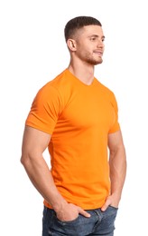 Photo of Man wearing orange t-shirt on white background. Mockup for design