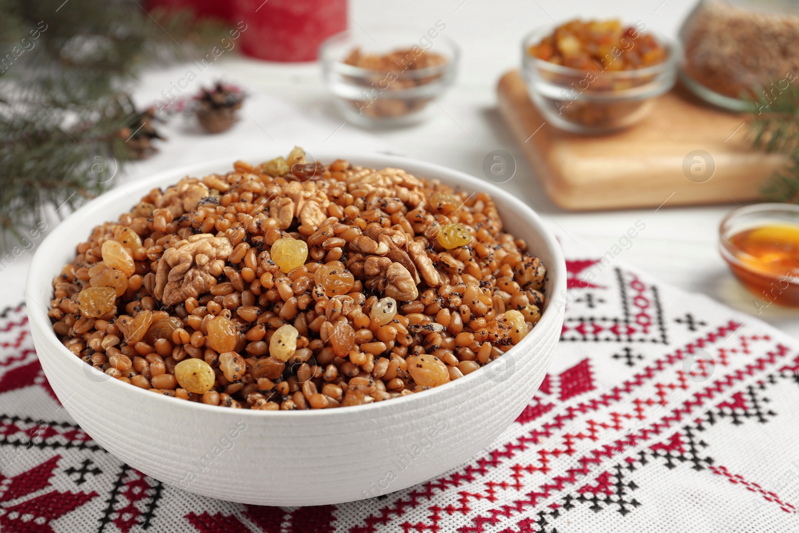 Photo of Traditional Christmas slavic dish kutia on table, closeup