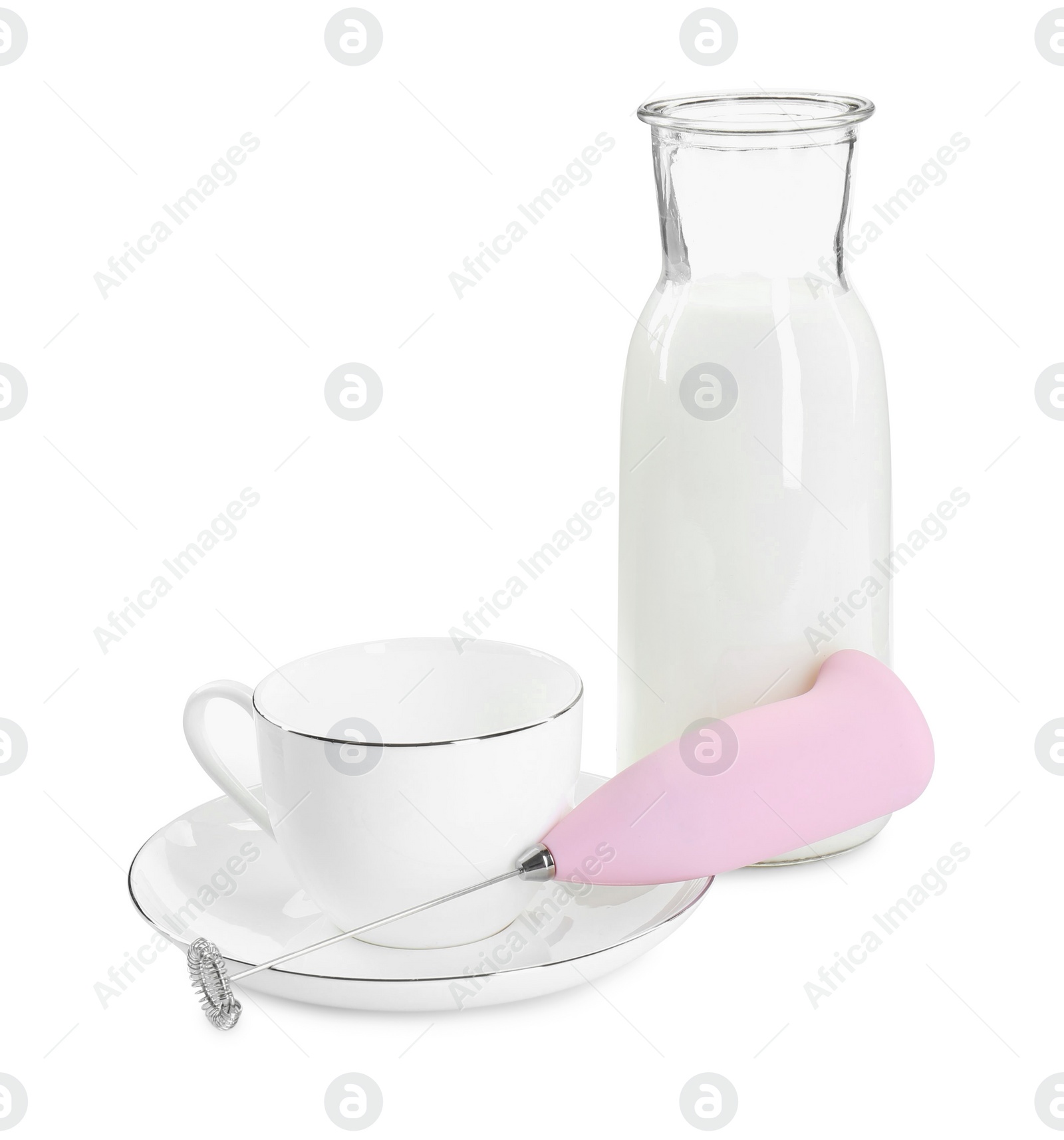 Photo of Milk frother wand, cup and glass carafe isolated on white