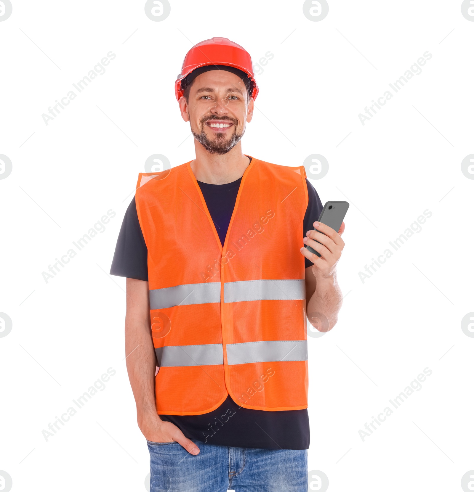 Photo of Male industrial engineer in uniform with phone on white background