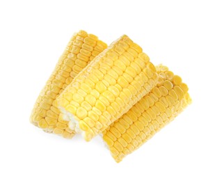 Pieces of corncobs on white background, top view