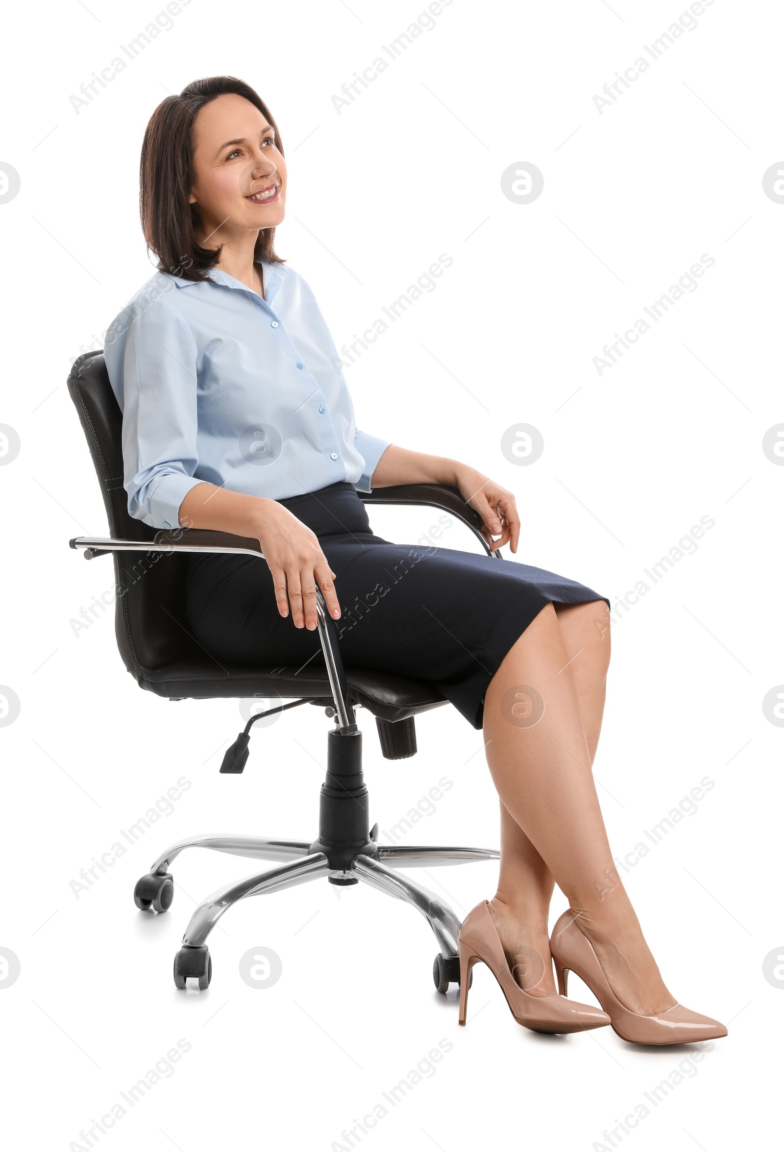 Photo of Mature businesswoman sitting in comfortable office chair on white background