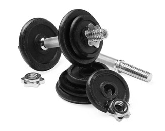 Metal dumbbell and parts on white background. Sports equipment