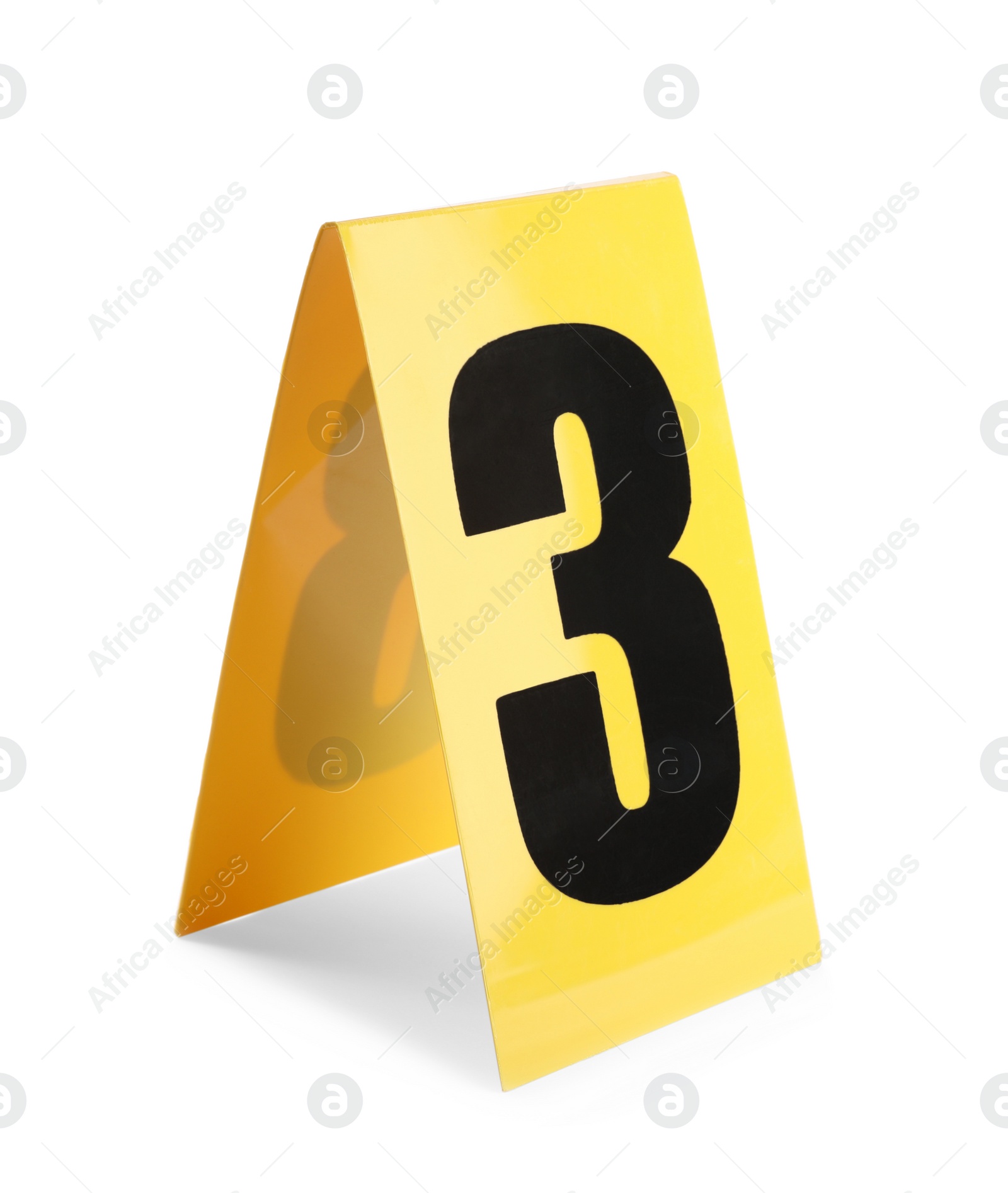 Photo of Yellow crime scene marker with number three on white background