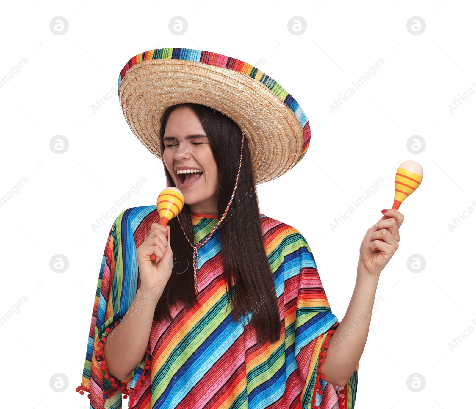 Photo of Young woman in Mexican sombrero hat and poncho with maracas on white background