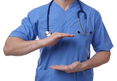 Doctor with stethoscope holding something on white background, closeup. Cardiology concept